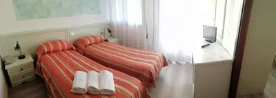 Letto o letti in una camera di Hotel Kristall