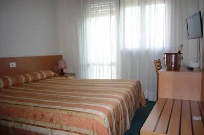 Letto o letti in una camera di Hotel Kristall
