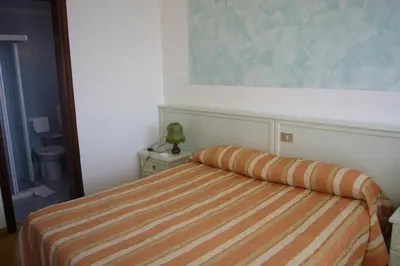 Letto o letti in una camera di Hotel Kristall