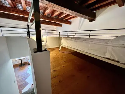Letto o letti in una camera di La Finestra Sul Ghetto
