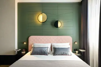 Letto o letti in una camera di Hotel Forte del 48