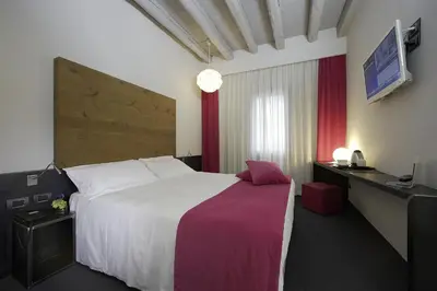 Letto o letti in una camera di Hotel Forte del 48