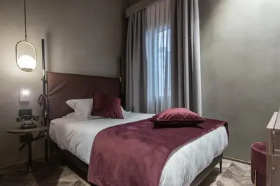 Letto o letti in una camera di Hotel Forte del 48