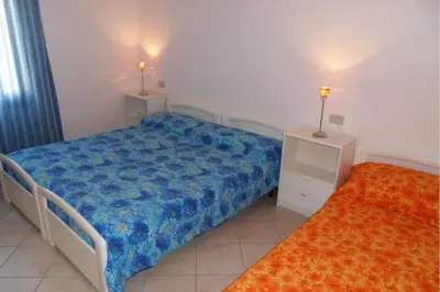 Letto o letti in una camera di Settimo cielo