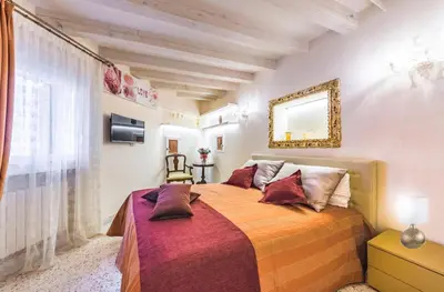 Letto o letti in una camera di San Marco Terrace