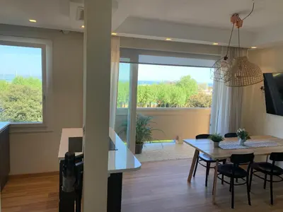 TV o dispositivi per l'intrattenimento presso Appartamento Fronte Mare Sottomarina