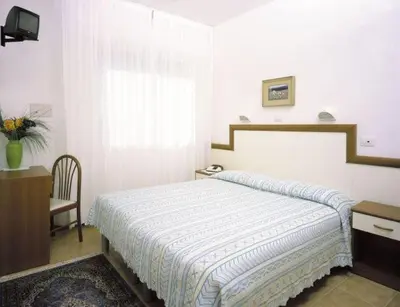Letto o letti in una camera di Hotel Bolivar