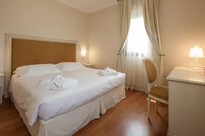 Letto o letti in una camera di Hotel Antico Mulino