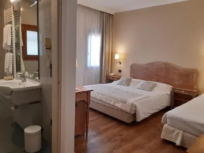 Letto o letti in una camera di Hotel Antico Mulino