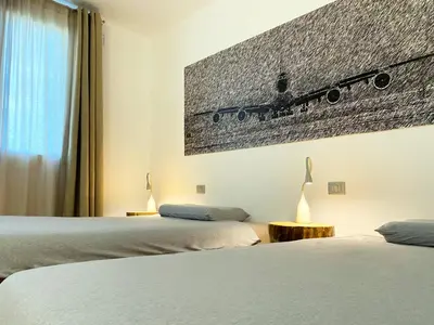 Letto o letti in una camera di Villa Sabbioni