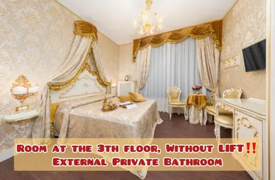 Letto o letti in una camera di La Veneziana Boutique Rooms 2