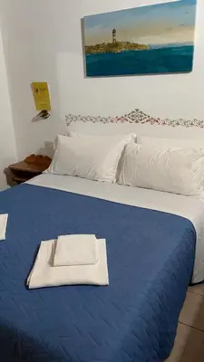 Letto o letti in una camera di Hotel Garni Tosca