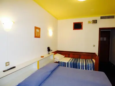 Letto o letti in una camera di Hotel Mon Repos