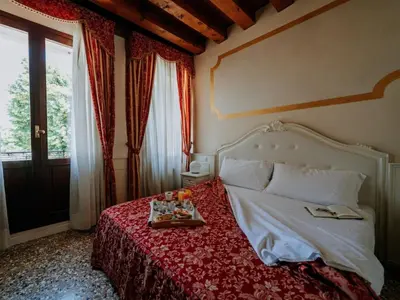 Letto o letti in una camera di Hotel Villa Patriarca