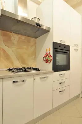 Cucina o angolo cottura di COZY APARTMENT NEAR RIALTO BRIDGE/ ST.MARK SQUARE