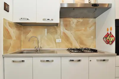 Cucina o angolo cottura di COZY APARTMENT NEAR RIALTO BRIDGE/ ST.MARK SQUARE