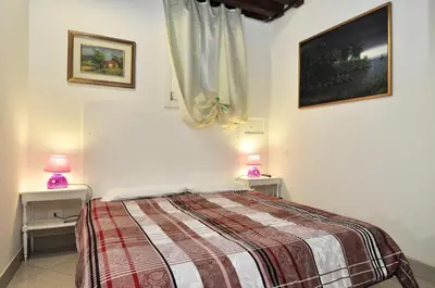 Letto o letti in una camera di COZY APARTMENT NEAR RIALTO BRIDGE/ ST.MARK SQUARE