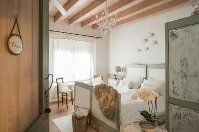 Letto o letti in una camera di B&B Maison Parco Del Brenta