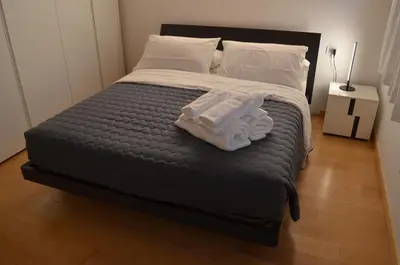 Letto o letti in una camera di Golf Jesolo Village ➔ Attico con Piscina