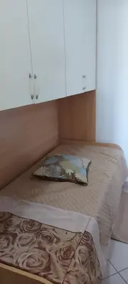 Letto o letti in una camera di APPARTAMENTO IN SOTTOMARINA DI CHIOGGIA