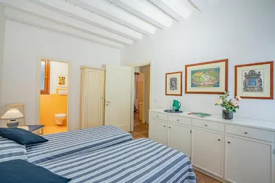 Letto o letti in una camera di Ca' Dei Musicanti 1 Few Steps from Rialto Bridge!
