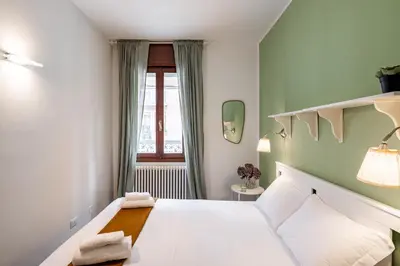 Letto o letti in una camera di GuestHost - Padova Park della Valle Apartment