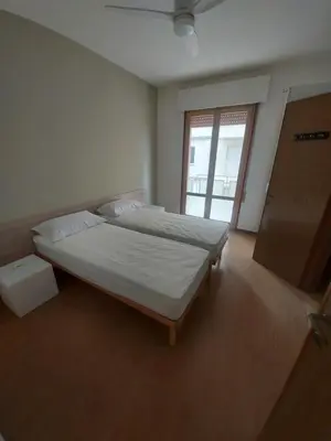 Letto o letti in una camera di Condominio Cismon