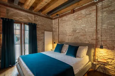 Letto o letti in una camera di Ca' Longo Palace Velluto