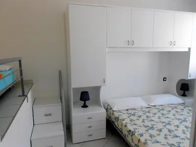 Letto o letti in una camera di Villa Bianca