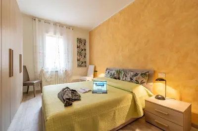Letto o letti in una camera di Ponte Squero Flat M0270423226