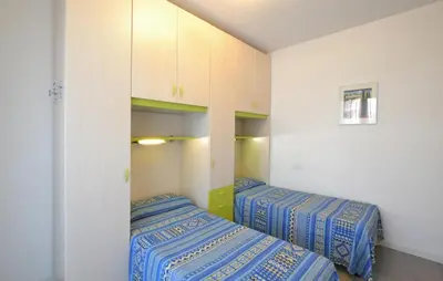 Letto o letti in una camera di Cozy Apartment In Cavallino-Treporti