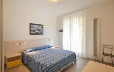 Letto o letti in una camera di Cozy Apartment In Cavallino-Treporti