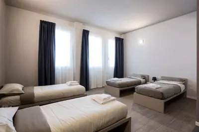 Letto o letti in una camera di Casa a Colori Padova
