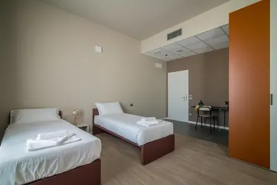 Letto o letti in una camera di Casa a Colori Padova