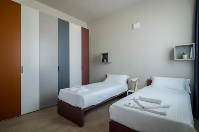 Letto o letti in una camera di Casa a Colori Padova