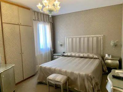 Letto o letti in una camera di Hotel Castello