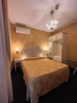 Letto o letti in una camera di Hotel Castello