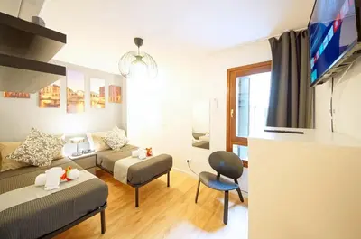 TV o dispositivi per l'intrattenimento presso DolceVita Apartments N 500 San Marco