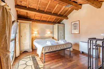 Letto o letti in una camera di Molino Stucky Residence Suites