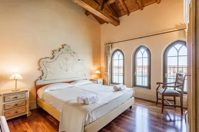 Letto o letti in una camera di Molino Stucky Residence Suites