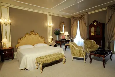Letto o letti in una camera di Ca' Sagredo Hotel