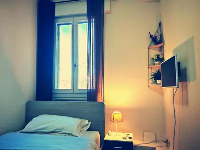 TV o dispositivi per l'intrattenimento presso Goldmine Guest House 2
