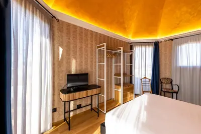 Letto o letti in una camera di Hotel Atlanta Augustus