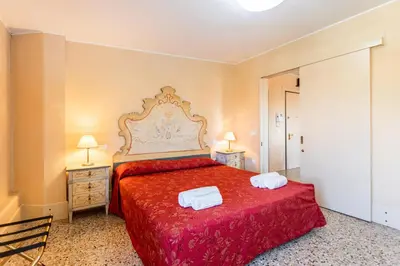 Letto o letti in una camera di Molino Stucky Residence Bragosso