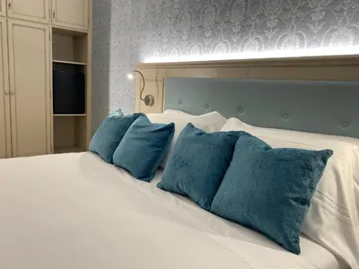 Letto o letti in una camera di San Lio Tourist House