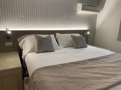 Letto o letti in una camera di San Lio Tourist House