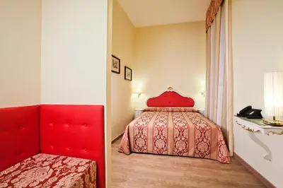 Letto o letti in una camera di San Lio Tourist House