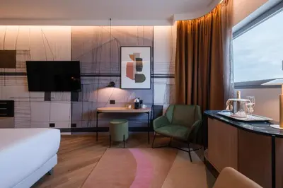 Letto o letti in una camera di Savhotel Mantegna Padova