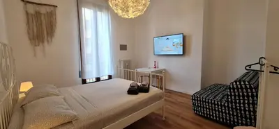Letto o letti in una camera di Takate Collection