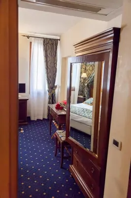 Letto o letti in una camera di Residenza Rivo Alto